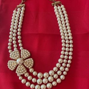 Elegant three strand pearl necklace